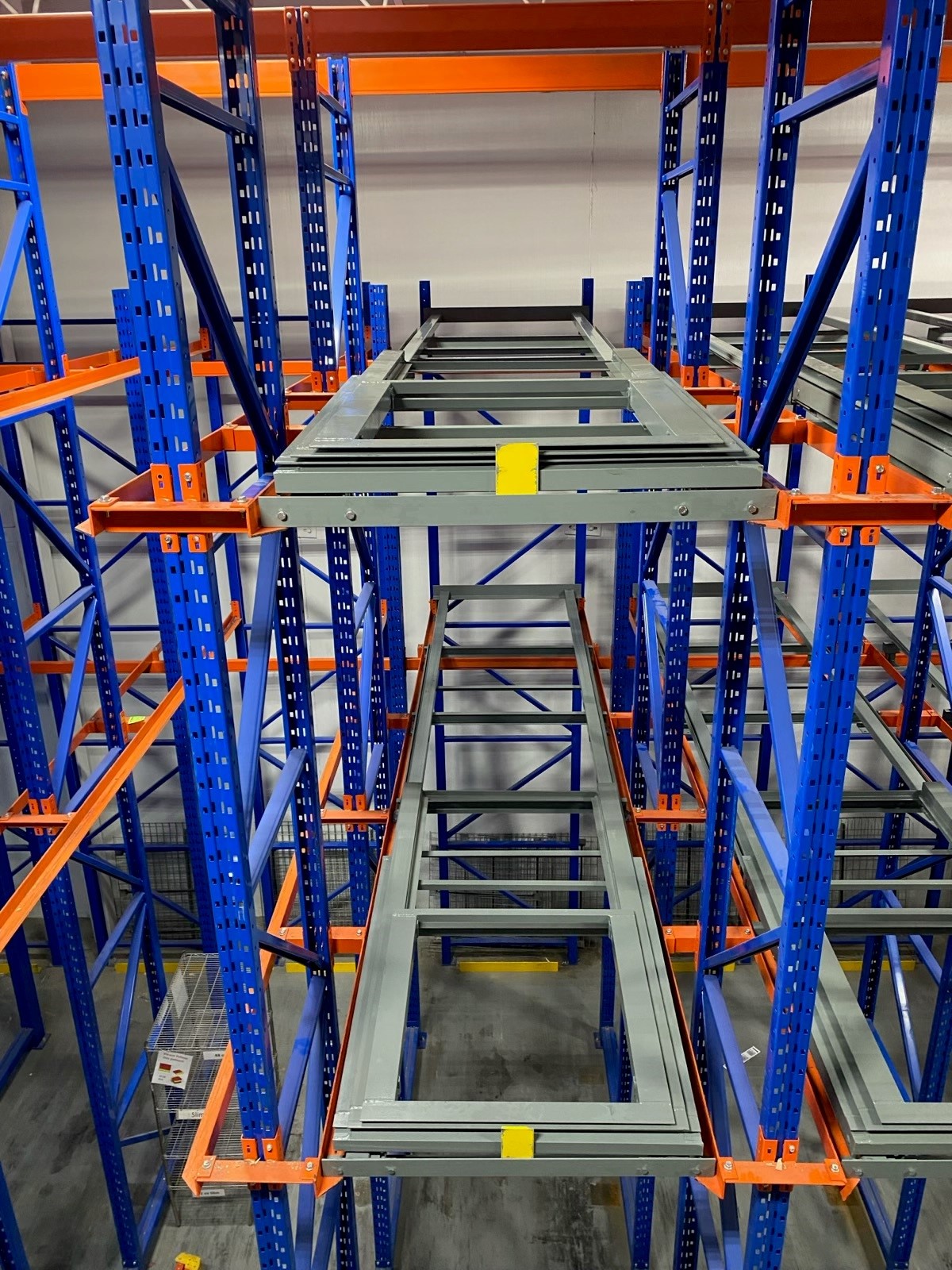 Example of pushback racking applied to drive-in racks